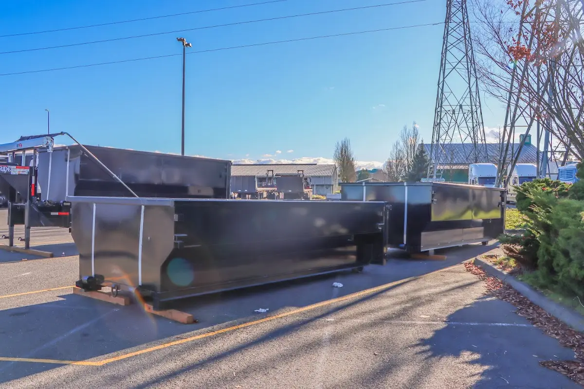 Roll-off dumpster ready for waste disposal at job site for 3 Yard Dumpster Rental in Norcross